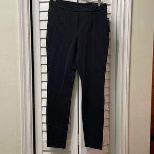Reitmans stretchy pants for work or play. New with tags. Faux pockets and zip!